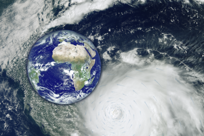 Satellite image of a massive cyclone over the ocean with an inset image of Earth on the left, centered on Africa. The logo of the European Space Agency (ESA) appears in the top right corner.