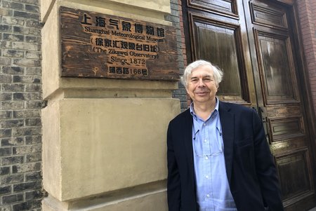 Photo: Brasseur in front of a wall of the Shanghai Meteorological Museum